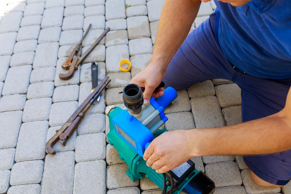 Man repairing a pump